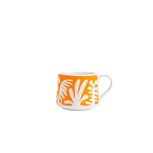 Ty Williams - Under the Sea - 12oz Crescent MugtevanaaWhite mug with orange and white leaf pattern on a white background